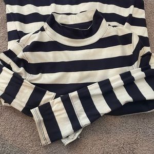 Free People Long Sleeve Shirt. Has a loose peplum style.